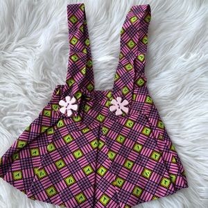 Pink Little girl pleated skirt with flower button up Braces. 3 months. Handmade